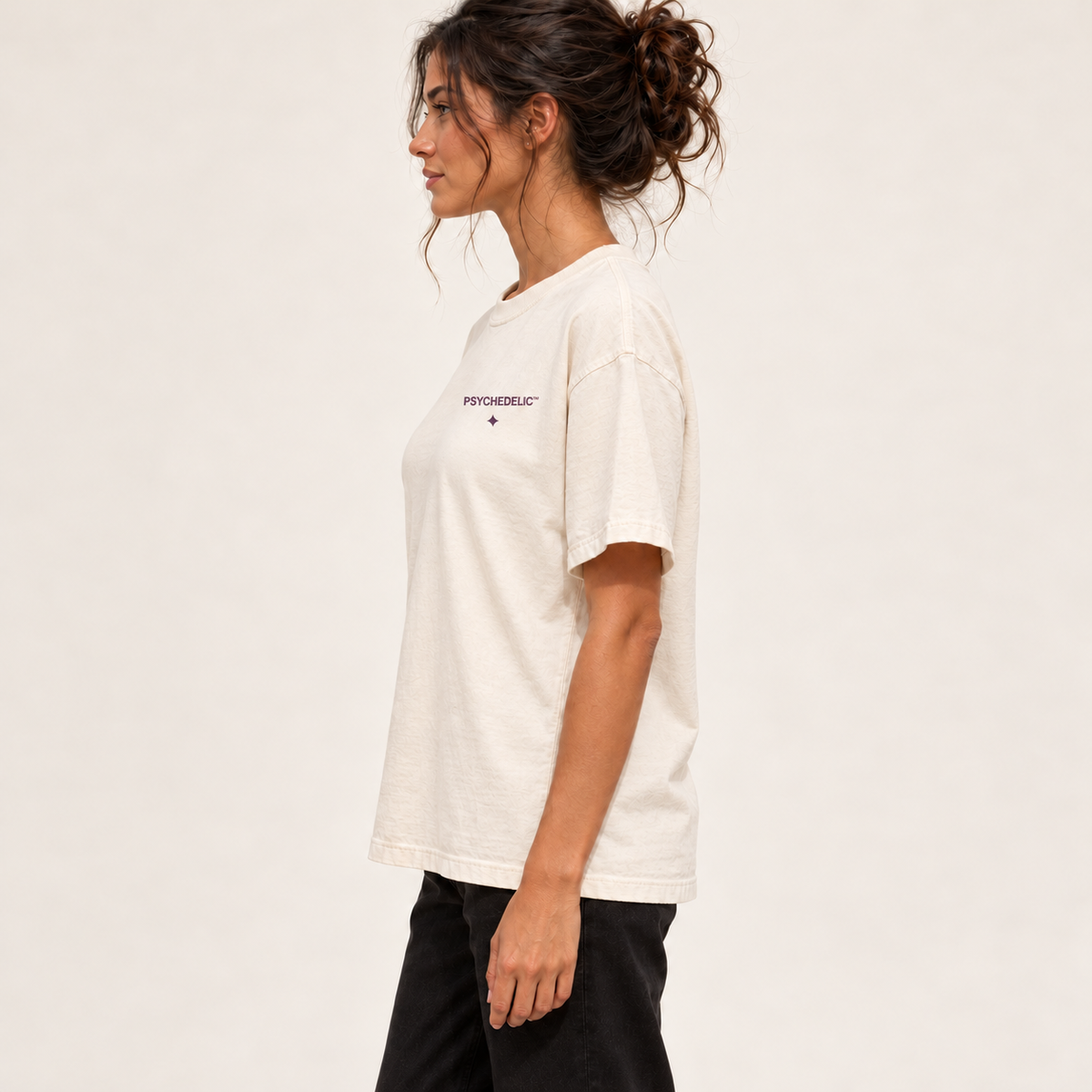 Less Ego. More Universe. Tee in Ivory — AI studio mockup, side profile